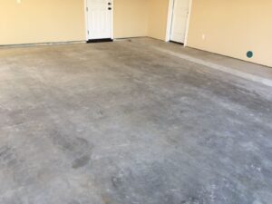 Broom finish concrete before epoxy grinding