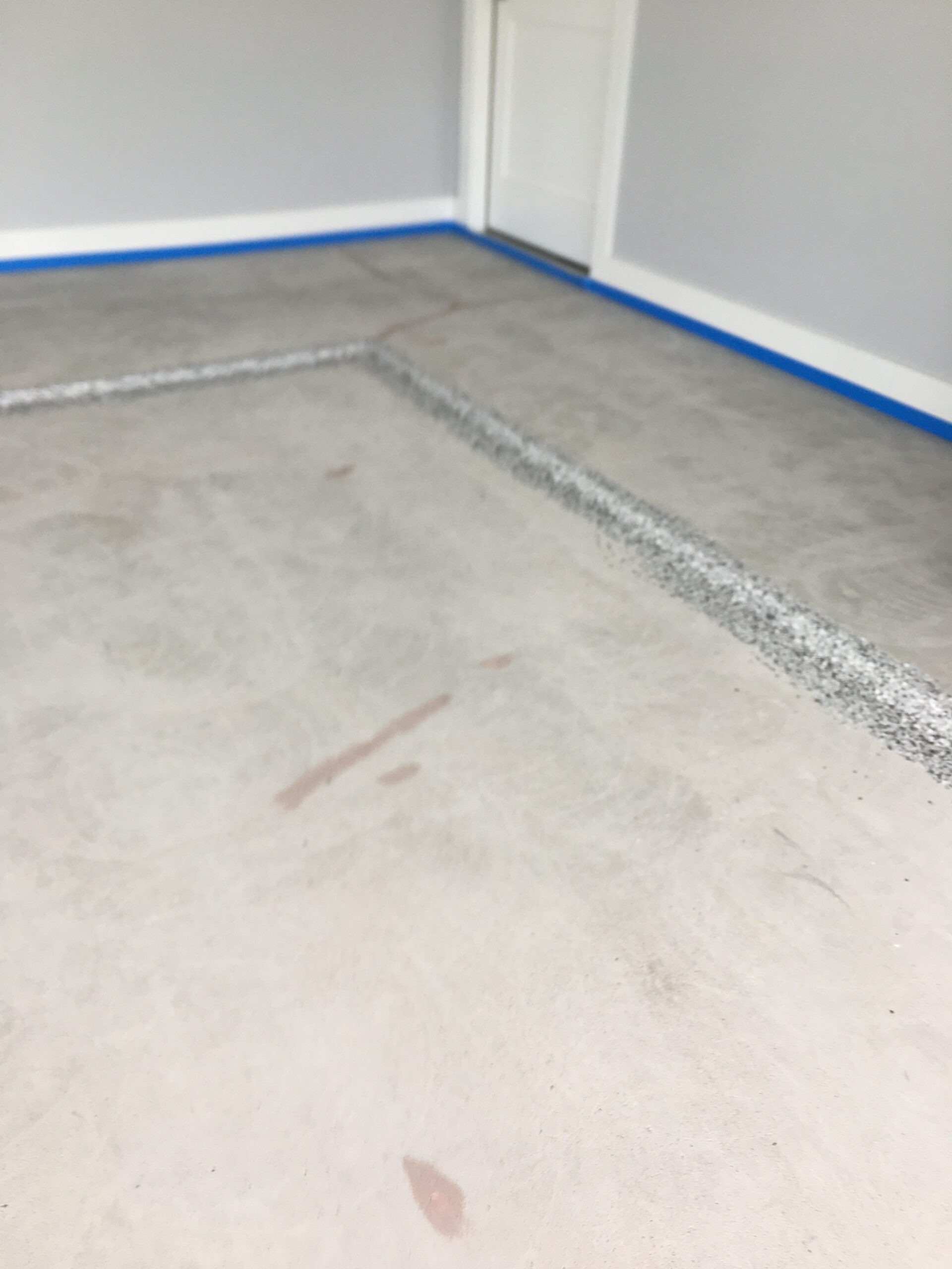 Photo from one of our Projects. The garage floor is in bad shape. We had to grind the floor, etch it, and then clean the floor. Next, we filled in the cracks and holes. This  process usually takes about 6 hours.